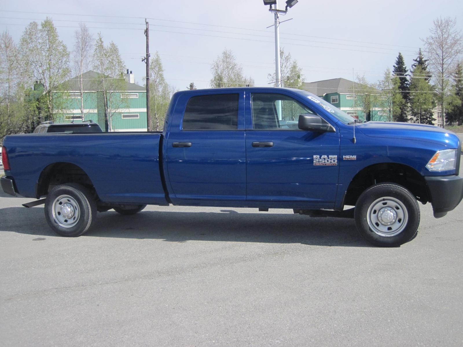2016 blue /gray RAM 2500 Tradesman Crew Cab 4WD (3C6TR5HTXGG) with an 5.7L V8 OHV 16V engine, automatic transmission, located at 9530 Old Seward Highway, Anchorage, AK, 99515, (907) 349-3343, 61.134140, -149.865570 - Photo #3